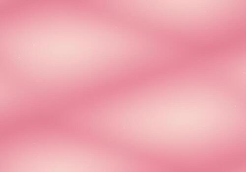 A pink background with a few small dots photo