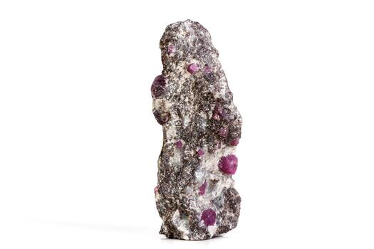 Macro of a mineral Ruby stone on a white background a photo