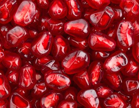 Fresco granada semillas arilos antecedentes textura con rubí rojo color foto