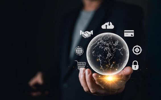 A professional person holds a glowing globe with digital icons, symbolizing global connectivity, technology, and commerce in a modern business context. photo