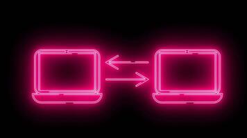 icon of two laptops sending data to each other with neon effect video