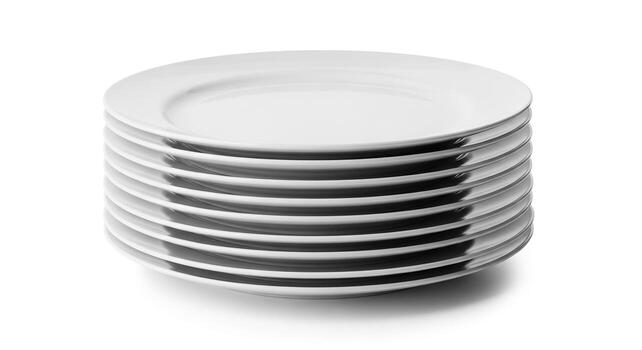 Stack of white plates isolated on white background, a simple and elegant tableware set photo