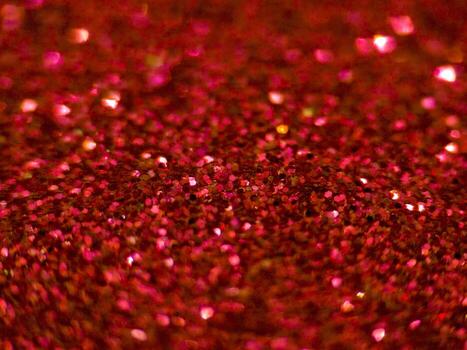 Red glitter macro texture background with sparkling bokeh effect photo