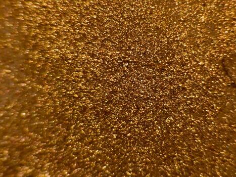 macro textura de dorado Brillantina creando un espumoso resumen antecedentes foto