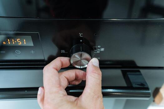 Adjusting the Oven Temperature Control using your hand for achieving precise and accurate cooking results is an essential skill for any chef or baking enthusiast in the culinary arts photo