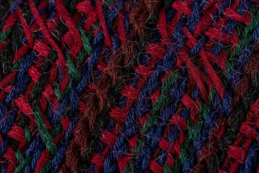 Vibrant abstract texture of colorful yarn strands in red blue and green photo