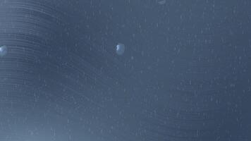 abstrakt bakgrund av en regnig fönster med vatten droppar och ränder. en lynnig och atmosfärisk våt glas yta textur video