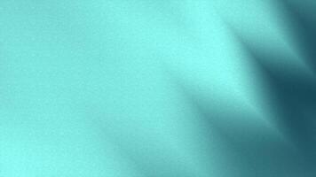 Modern abstract backdrop in a calm turquoise hue, featuring soft flowing light and a subtle grainy texture for a sophisticated design video