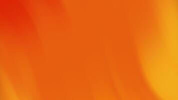 Vibrant flowing abstract background with a smooth gradient of warm orange, yellow, and red hues, creating a dynamic and serene visual effect video