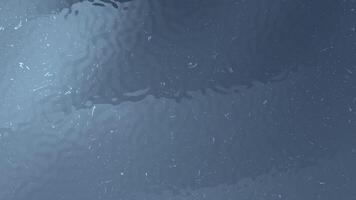 abstrakt bakgrund terar en mörk, porlande flytande yta med en vätska och dynamisk textur video