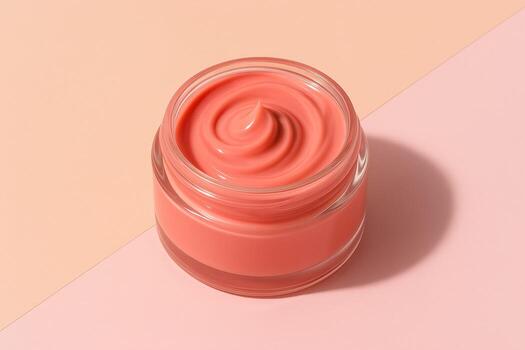 Pink cream in glass jar on pastel background with smooth texture and vibrant color photo