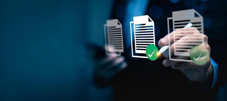 Businessman using digital pen to approve virtual document icons with green check marks, representing online document verification, digital signature, data approval workflow, electronic documentation photo