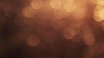 warm, gloeiend bokeh lichten creëren een knus, uitnodigend abstract achtergrond voor ieder feestelijk gelegenheid video