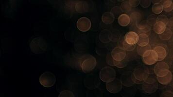 Dreamy golden bokeh lights background, perfect for adding a touch of magic to your projects and designs video