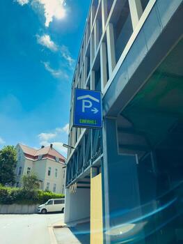 The contemporary parking structures signage effectively indicates the number of available parking spaces in an urban setting, enhancing accessibility and convenience for all visitors photo