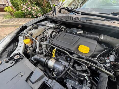 A Detailed View of a Contemporary Automotive Engine Compartment Showcasing Its Efficient Design and HighQuality Components That Contribute to Enhanced Performance and Improved Functionality photo