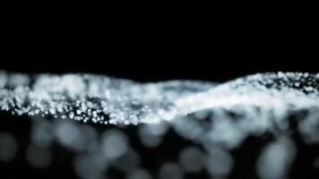Abstract Animation of a Flowing Wave of White Particles with a Shallow Depth of Field on a Dark Background video