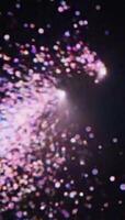 Magical Animation of a Swirling Vortex of Pink and Purple Bokeh Particles Creating a Futuristic Tunnel or Wormhole video