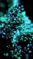 etéreo corrente do brilhando azul e verde digital partículas ascendente dentro uma suave foco bokeh efeito, criando uma mágico e futurista abstrato fundo. video