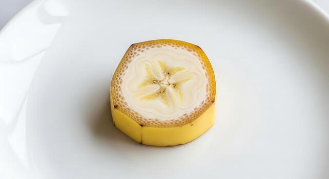 Banana slice styled with yogurt bowl topped with nuts and honey photo