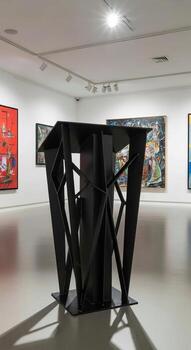 A black table with a black base photo