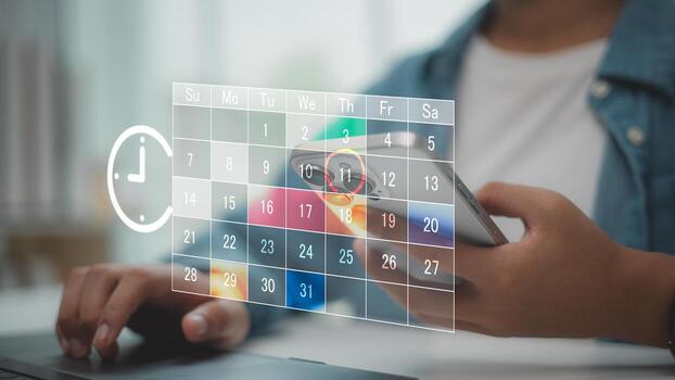Digital calendar scheduling concept with person holding smartphone, marking important date. Ideal for productivity, planning, appointment reminders, and time management on mobile devices. photo