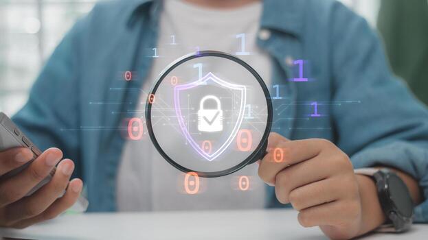 Cybersecurity and data protection concept with magnifying glass focusing on digital lock shield. Suitable for IT security, privacy, cyber defense, secure system, and online safety solutions. photo