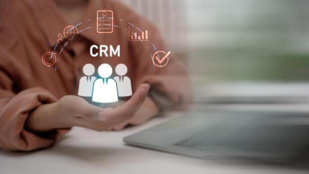 Hand presenting CRM icons with people, chart, target, checklist, and network, symbolizing customer relationship management system in modern digital business strategy. photo