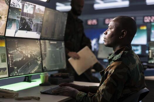 Counterterrorism division operative wearing camouflage uniform using target acquisition tech to detect enemy location. Defense security expert using satellite hardware to track dangerous threats photo