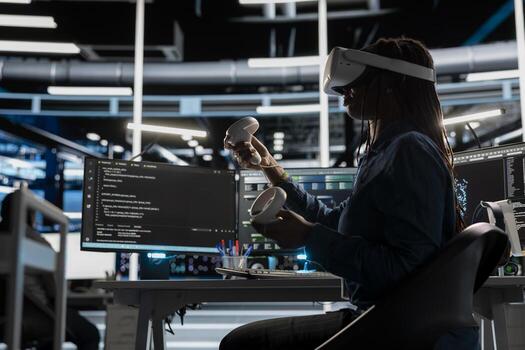 Data center IT expert using VR equipment tech to train neural networks. Server room engineer using virtual reality technology to setup machine learning systems handling information photo