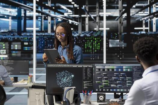 Data center computer scientist uses AI visualization program to oversee automated repetitive tasks. Woman in server hub modifying infrastructure rigs systems based on data analytics graphs photo