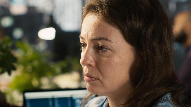 Close up of sad company manager checking revenue KPIs, stressed by low numbers. Portrait of tired management executive feeling dejected while reviewing project tasks data, camera A photo