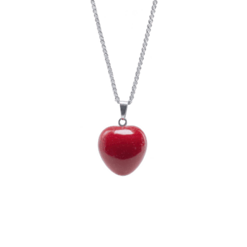 Silver chain necklace with glossy red heart shaped pendant is displayed against transparency background, highlighting its elegant and romantic design png