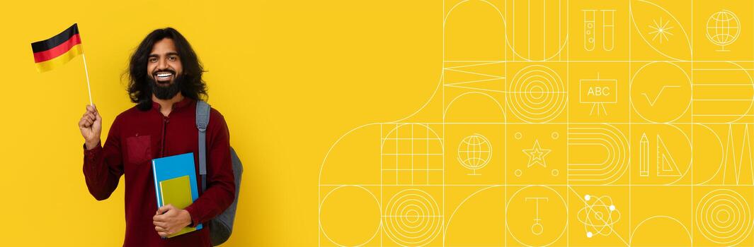 A cheerful student holds a flag while standing with books in a bright and colorful environment. The background features a painted design, enhancing the educational atmosphere. photo