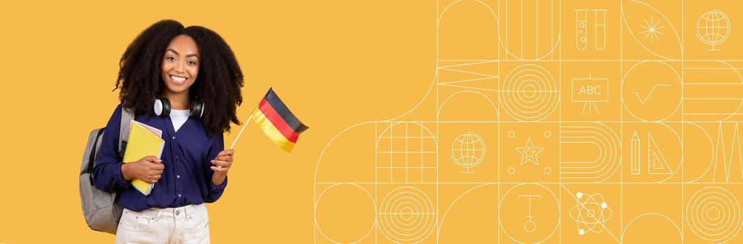A student holds a German flag alongside a notebook and folder while smiling in a vibrant, painted background. This setting creates an inspiring atmosphere for education and learning. photo