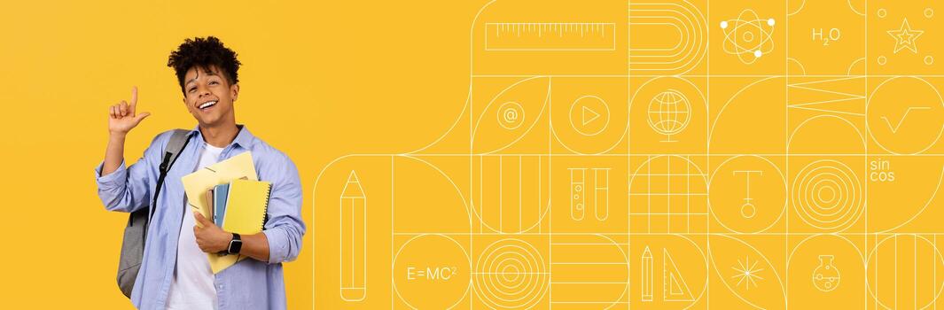 A joyful student stands against a vibrant yellow background, holding multiple study materials and smiling. This setting promotes a positive attitude toward education and learning. photo