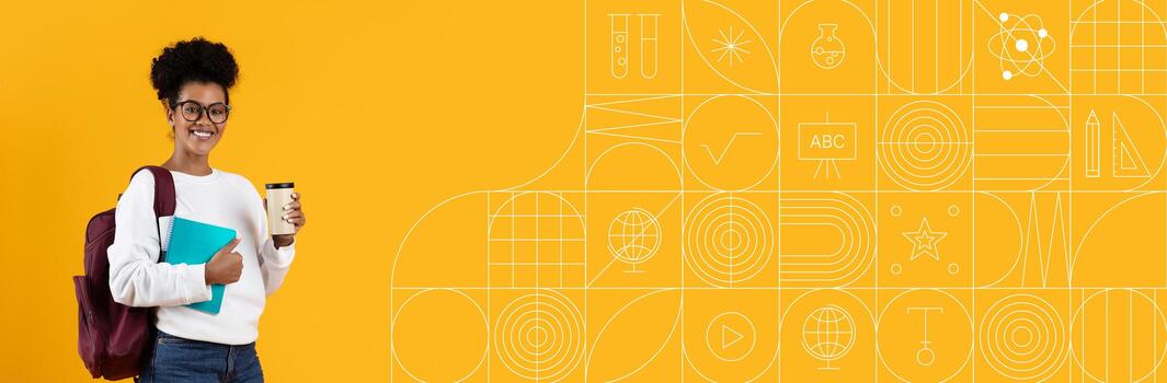 A cheerful student stands against a bright yellow backdrop, holding a coffee cup and a notebook. This setting is perfect for promoting education and learning in a collaborative environment. photo