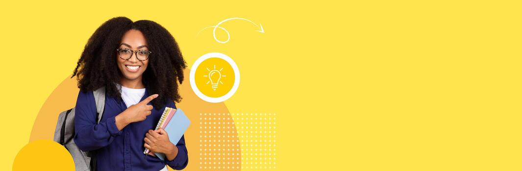 A student stands confidently with books in hand, smiling and pointing towards an icon representing ideas. The bright background reflects a new normal in education. photo