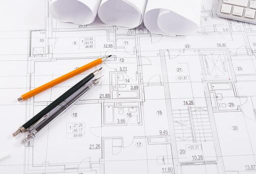 Workplace of architect. Pencils set on blueprint, engineering tools for creating new architectural project on table, copy space photo