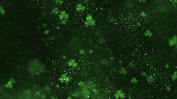 Glittering particles, shimmering bokeh light and shamrocks on a dark green gradient background. Glitzy glitter celebration party animation. Suitable as an abstract Saint Patrick's Day background. video