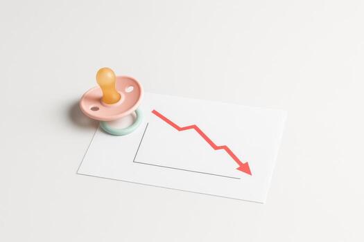 A baby pacifier with a graph on a white background photo
