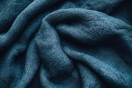 Soft blue fabric draping elegantly on a surface photo