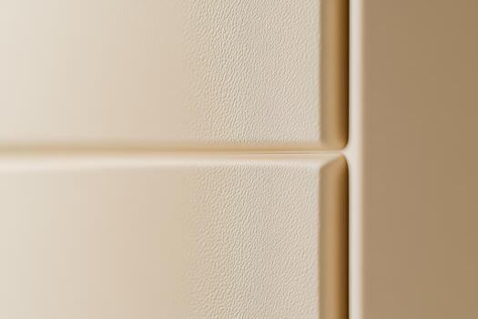 Exploring the texture and design of a cream-colored wall panel photo