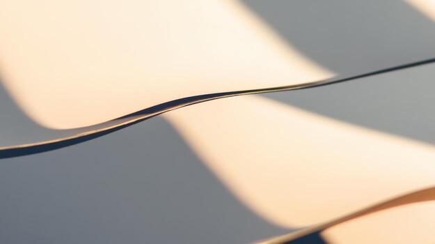 Soft shadows create elegant curves on a surface in sunlight photo