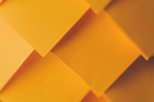Bright yellow sticky notes arranged in a creative pattern photo