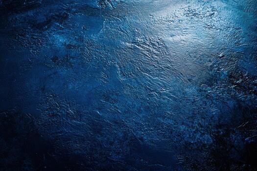 Dark blue textured surface showcasing depth and contrast photo