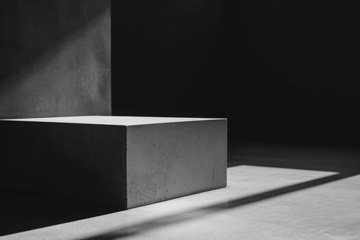 Stylish concrete block on floor with dramatic lighting photo