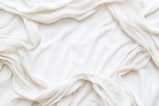 White fabric draped in soft and elegant shapes on a flat surface photo