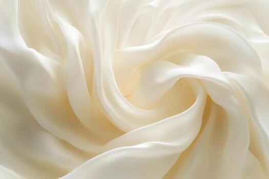 Soft white fabric creating elegant folds and waves photo