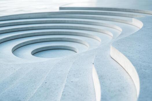 Elegant curved stone design with concentric circles in a park photo